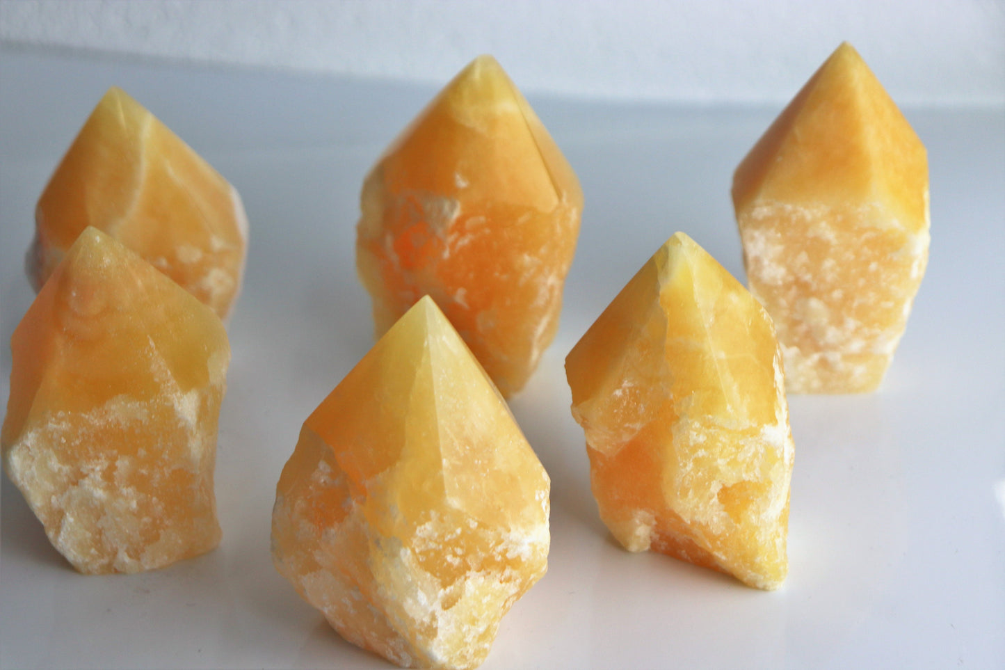 Orange Calcite Crystal Point Top Polished Brazil