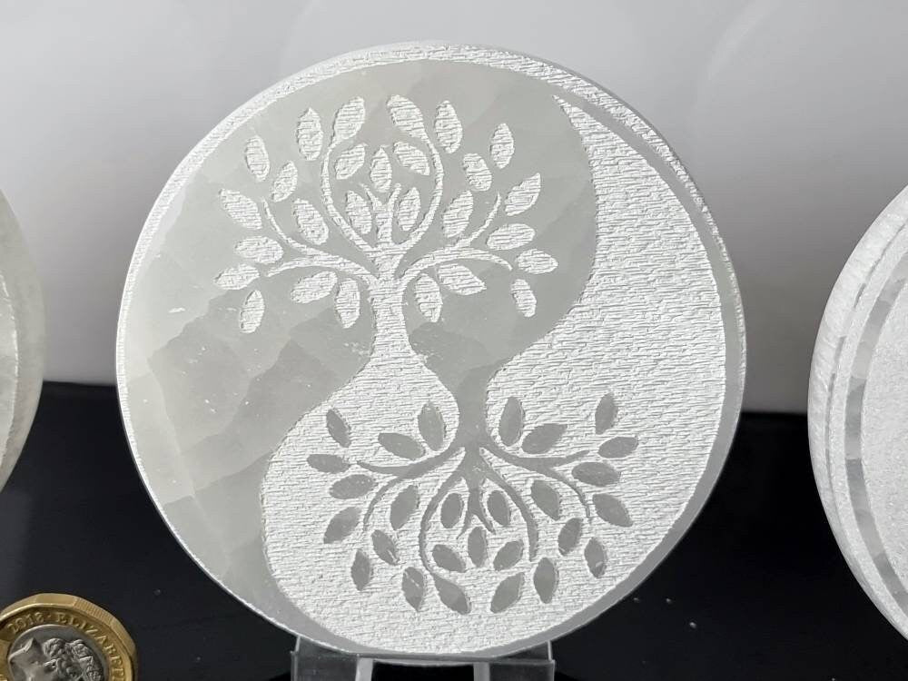 selenite plate with yin yang design