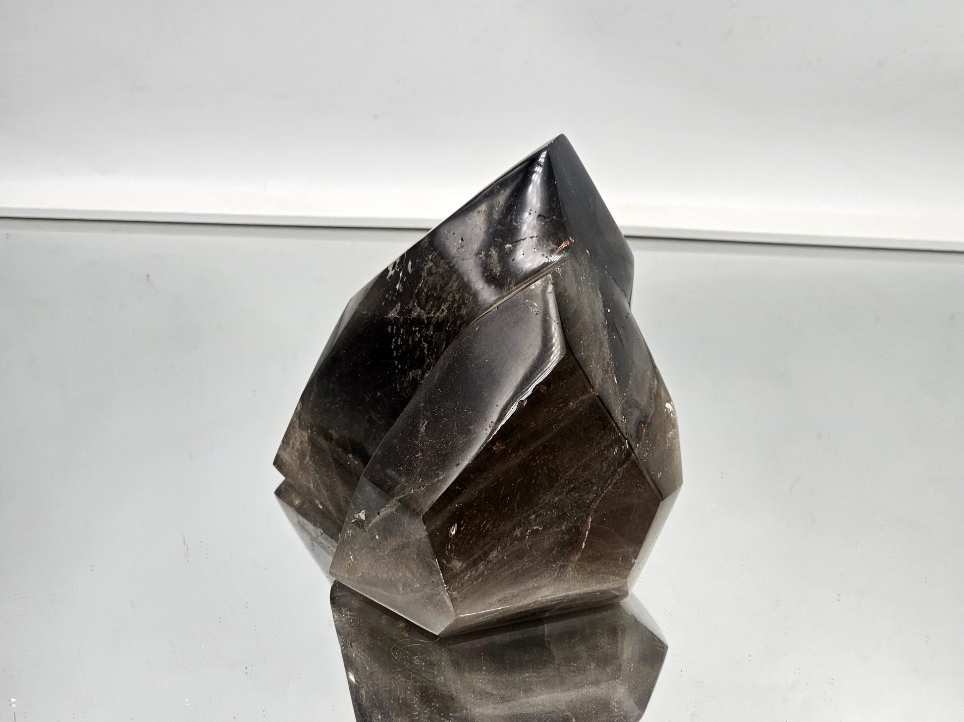 Polished smoky quartz crystal, a unique decor choice for luxury homes