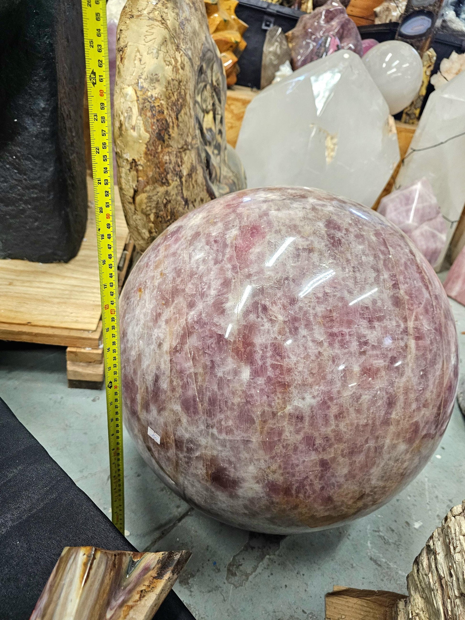 Elegant rose quartz crystal sphere displayed as a centerpiece for home décor