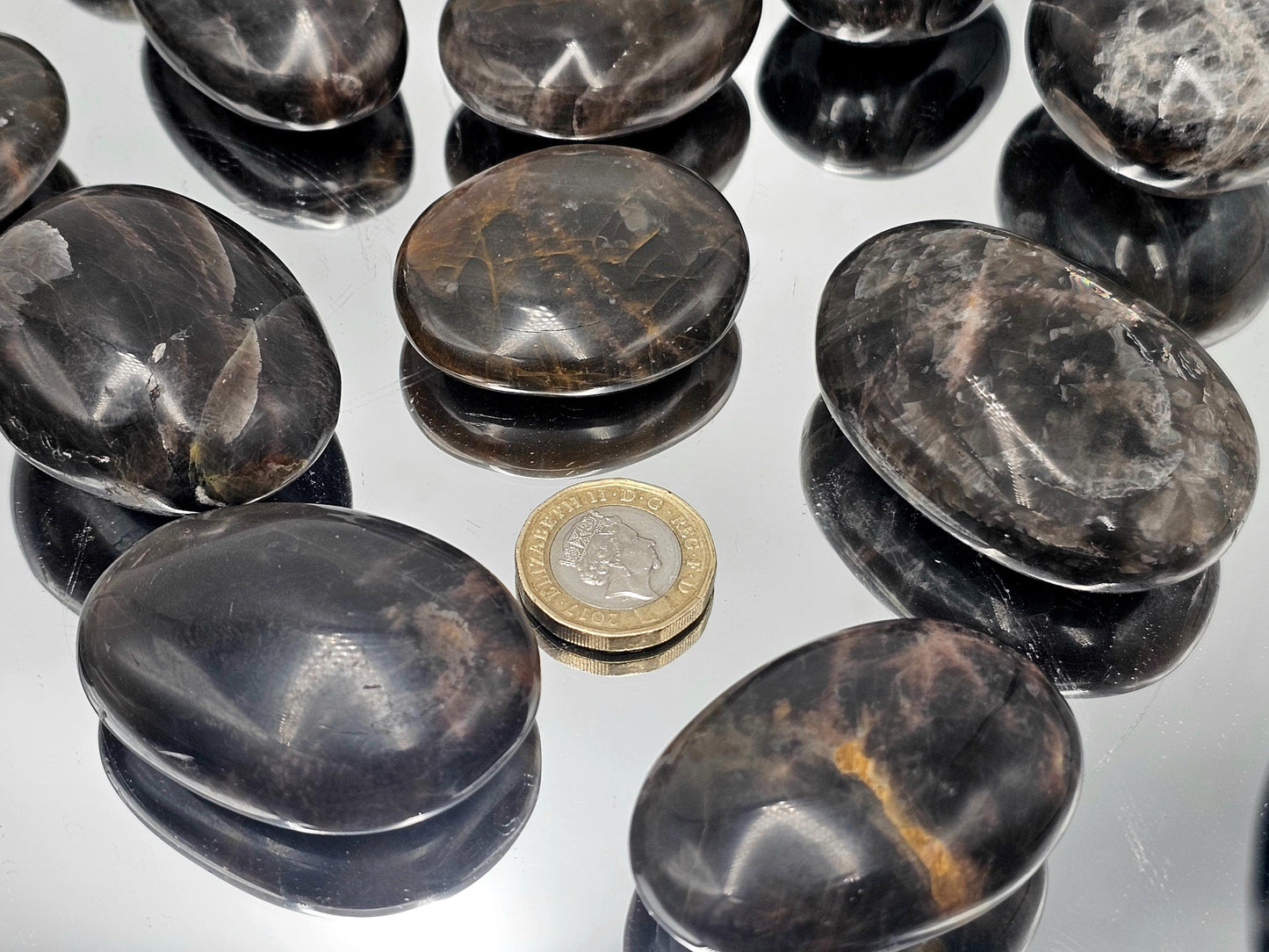 Beautifully polished Black Moonstone Palmstones, a must-have for crystal lovers.