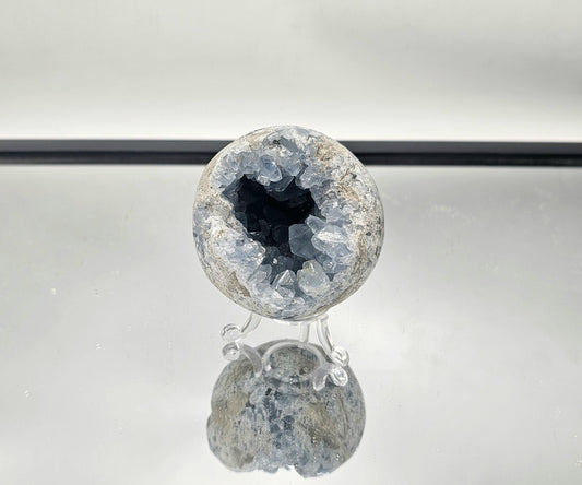 Celestite crystal sphere from Madagascar, perfect for display.