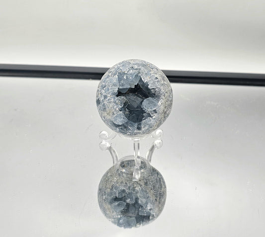 Celestite Sphere, a thoughtful gift for crystal collectors.