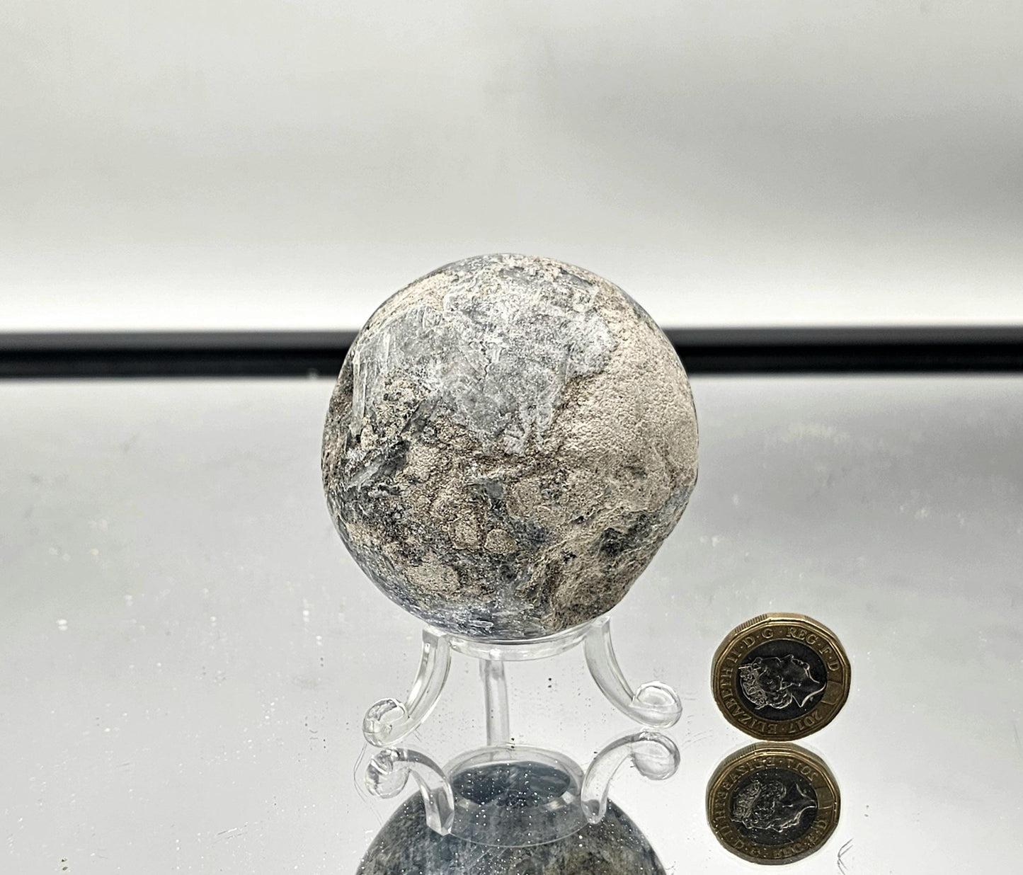 Natural stone Celestite Sphere as a unique home decoration.
