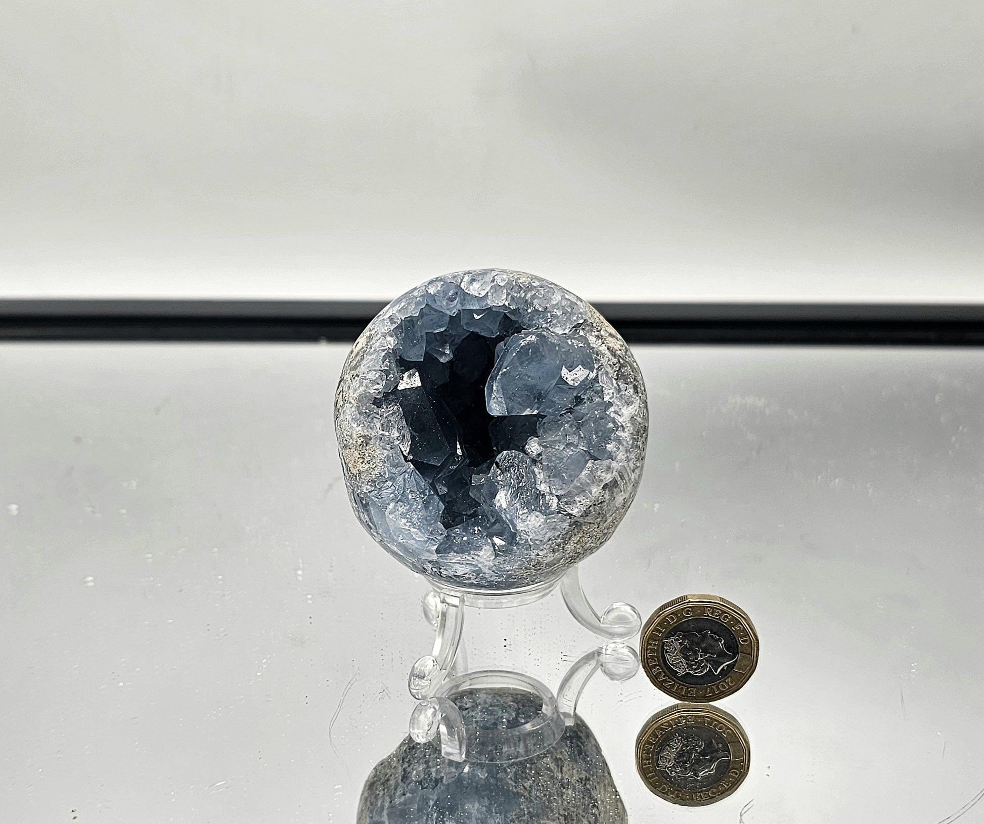 Zen-inspired décor with a calming Celestite Sphere.