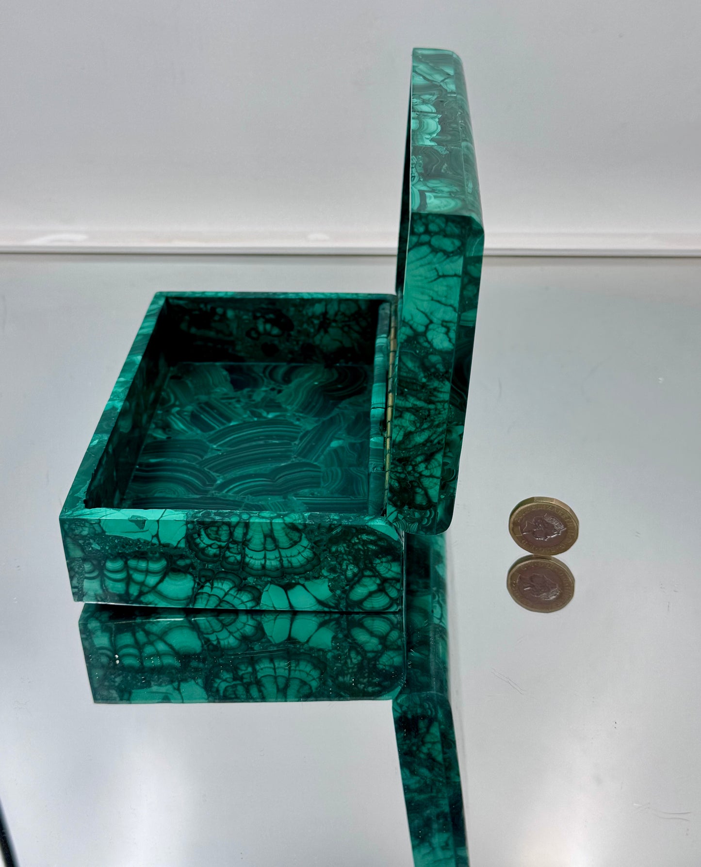 Unique malachite storage box, perfect for keeping jewelry and crystals safe.