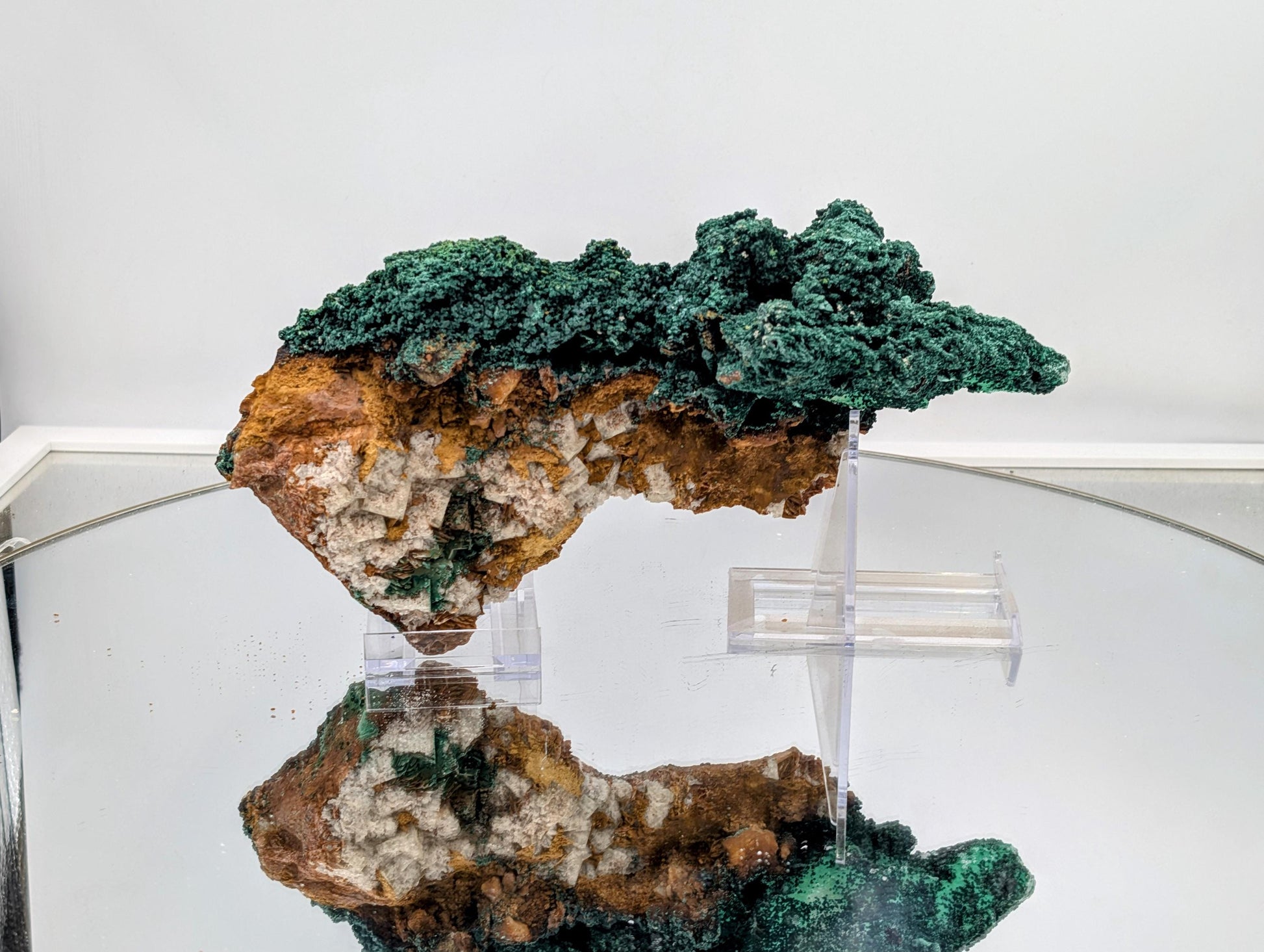 Exceptional malachite crystal on fluorite specimen from Morocco