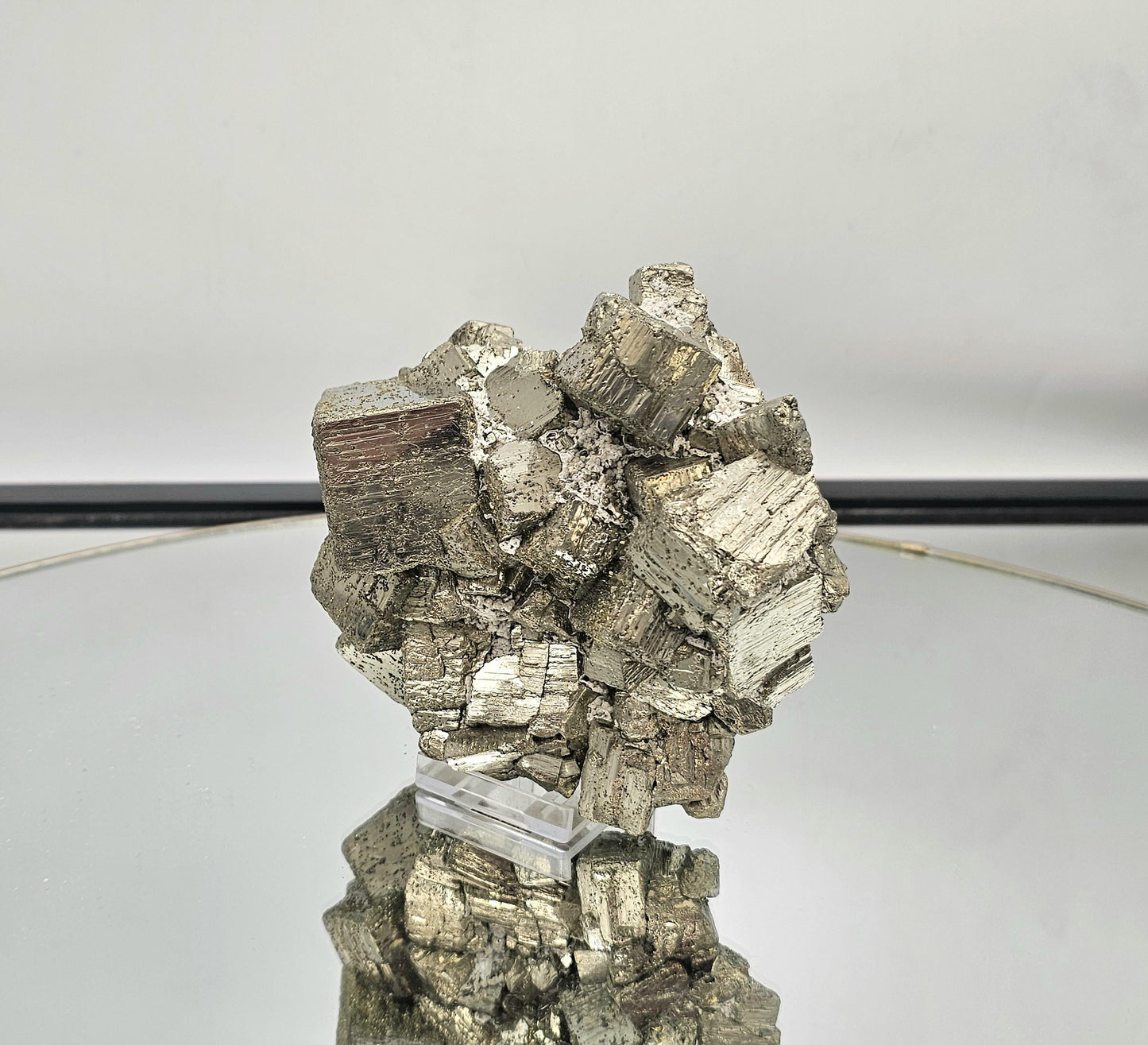 Exceptional Pyrite cluster with dazzling metallic formations – a perfect crystal display piece.