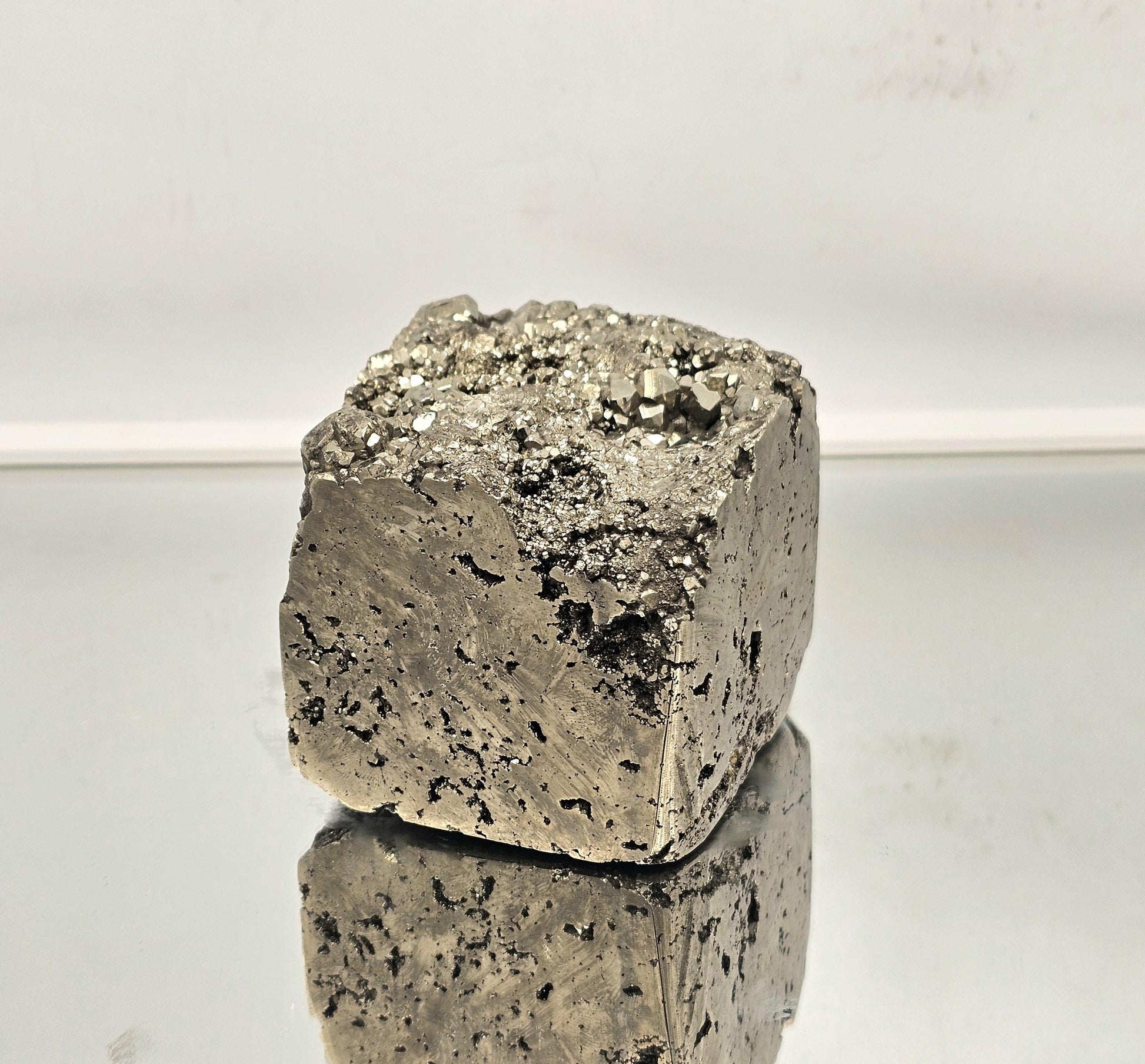 Large natural pyrite cube with intricate crystal details