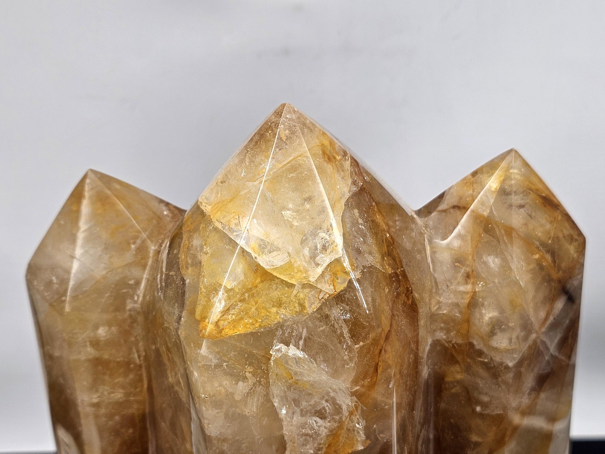 Luxurious Golden Healer Crystal Prism with contrasting hues, ideal for interior design and decor.