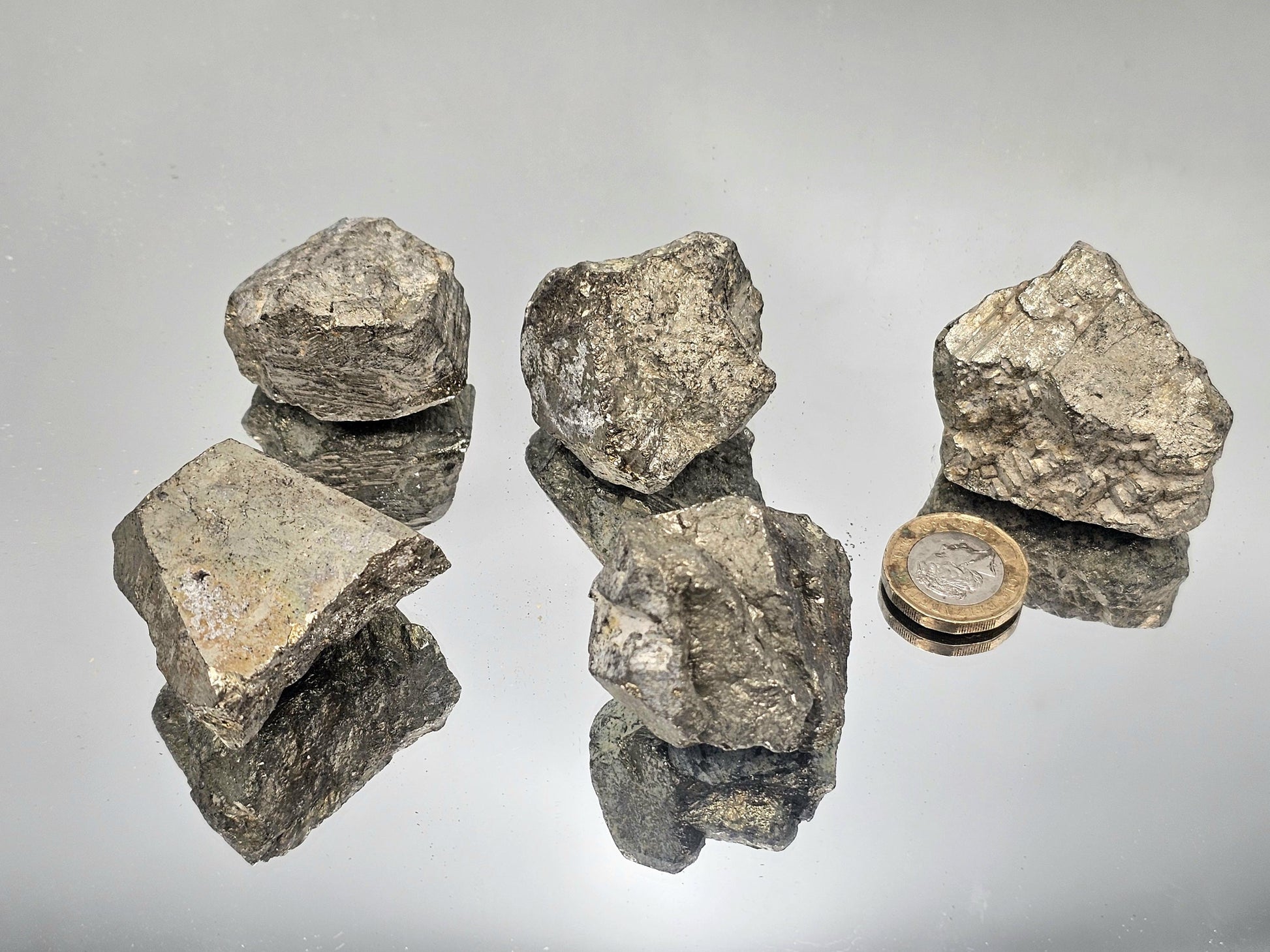 Large golden Pyrite chunks with natural geometric formations, perfect for collectors.