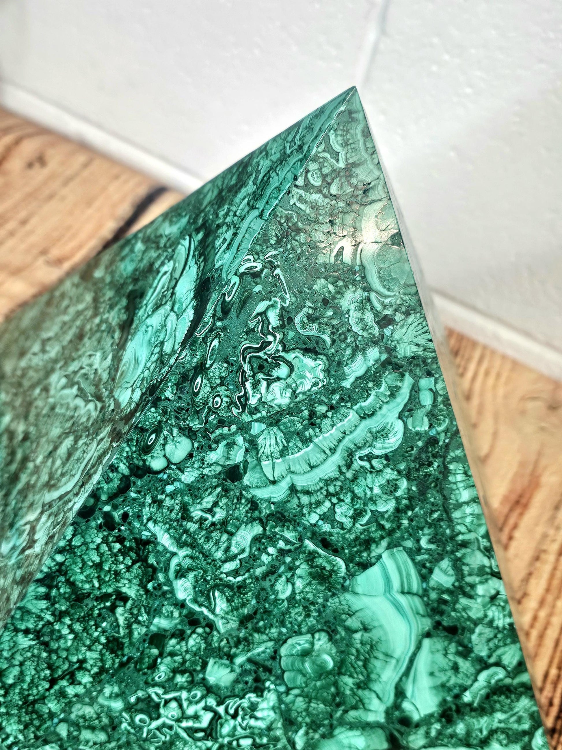 Handcrafted malachite pyramid for bespoke interior styling.