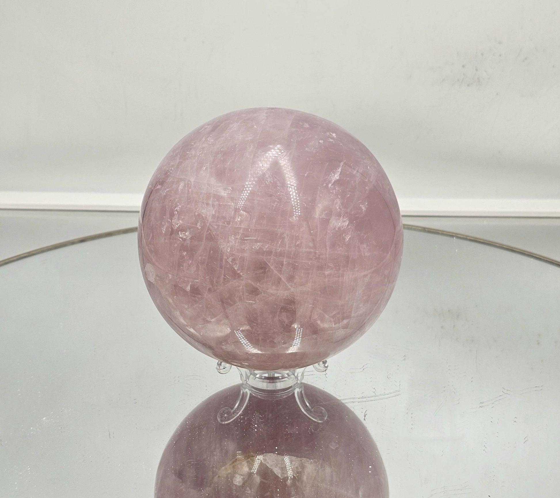 High-quality star rose quartz sphere with mesmerizing asterism