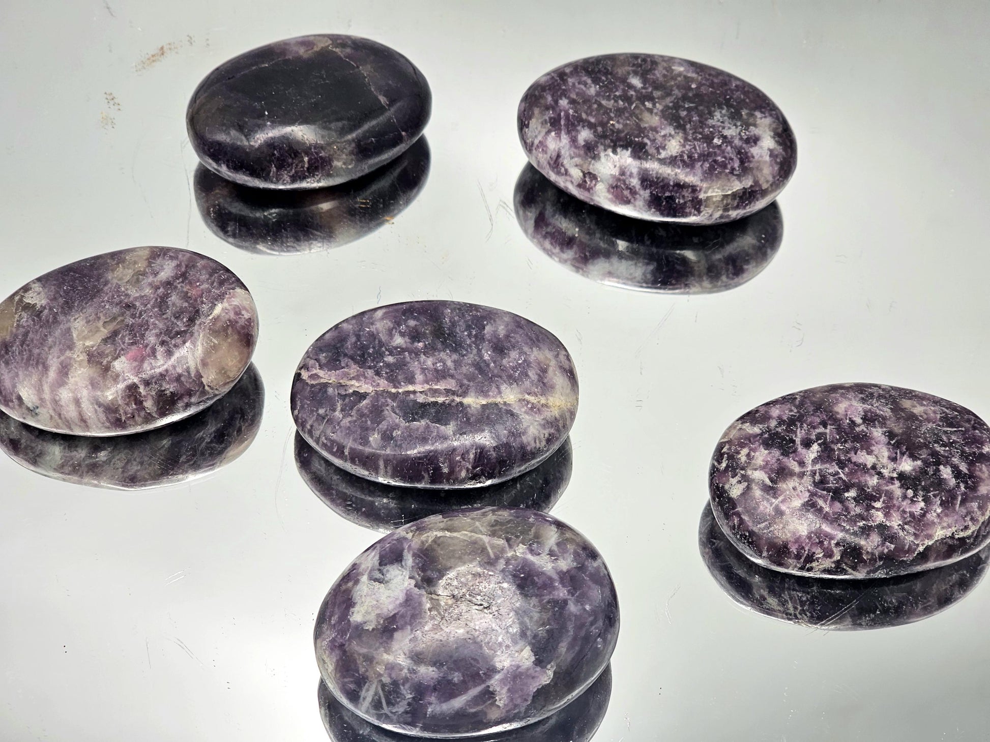 shop high quality crystal palmstones from Madagascar