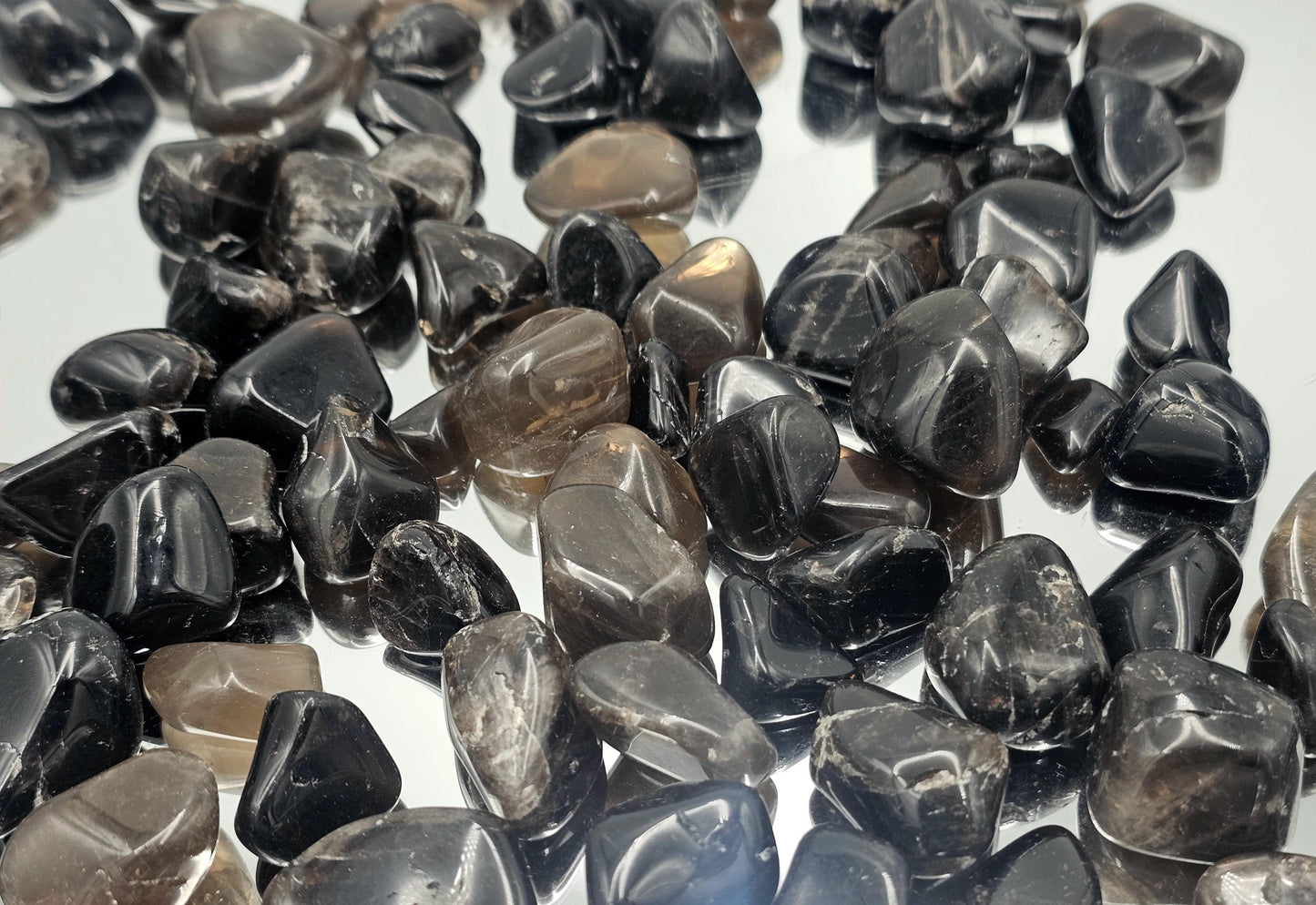 high quality morion smoky quartz tumblestones from Madagascar 