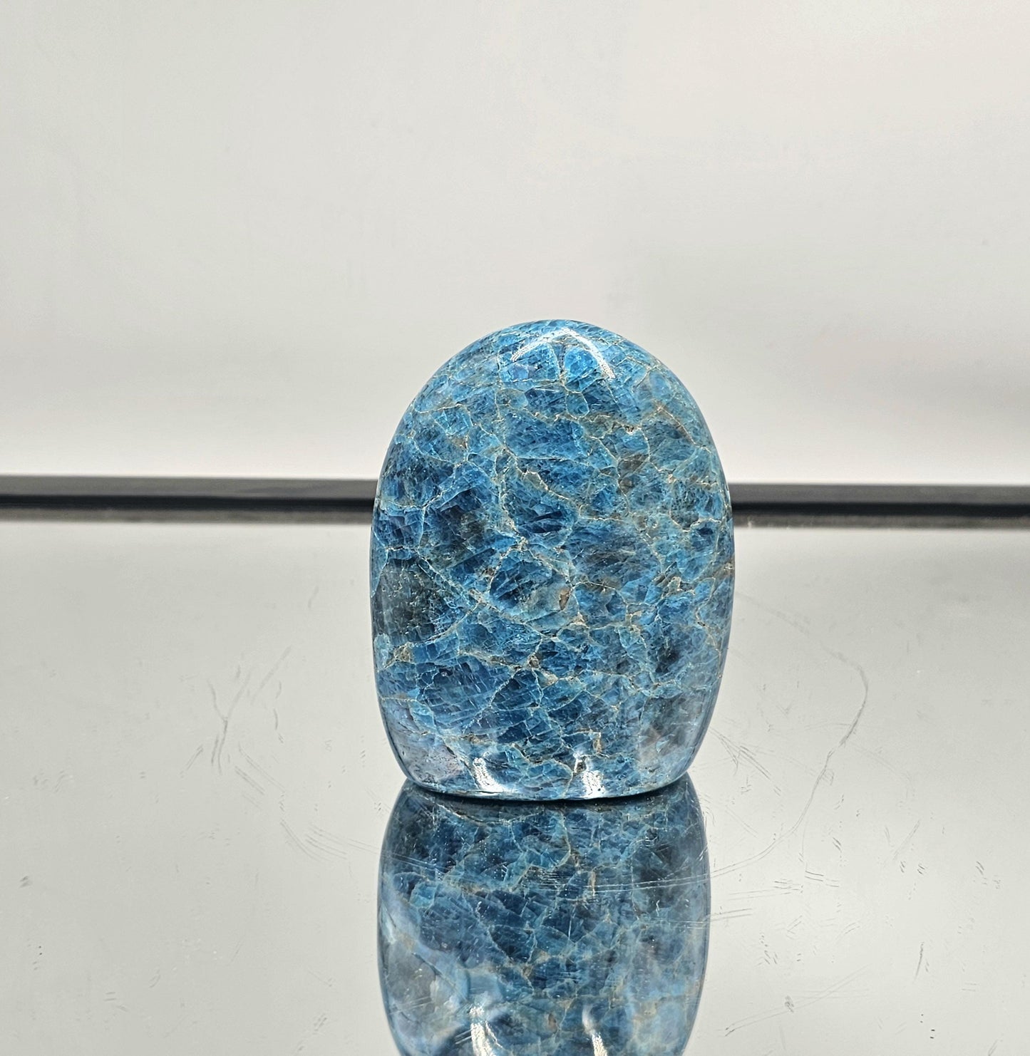 Large polished Blue Apatite crystal freeform sourced from Madagascar.