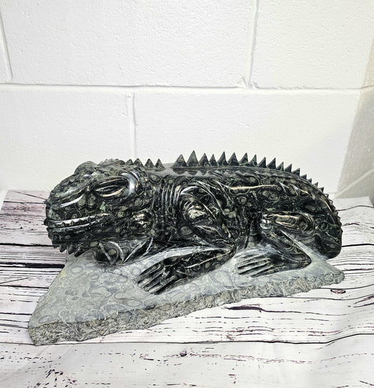 Large Kambaba Jasper Iguana carving, hand-polished for luxury interiors.
