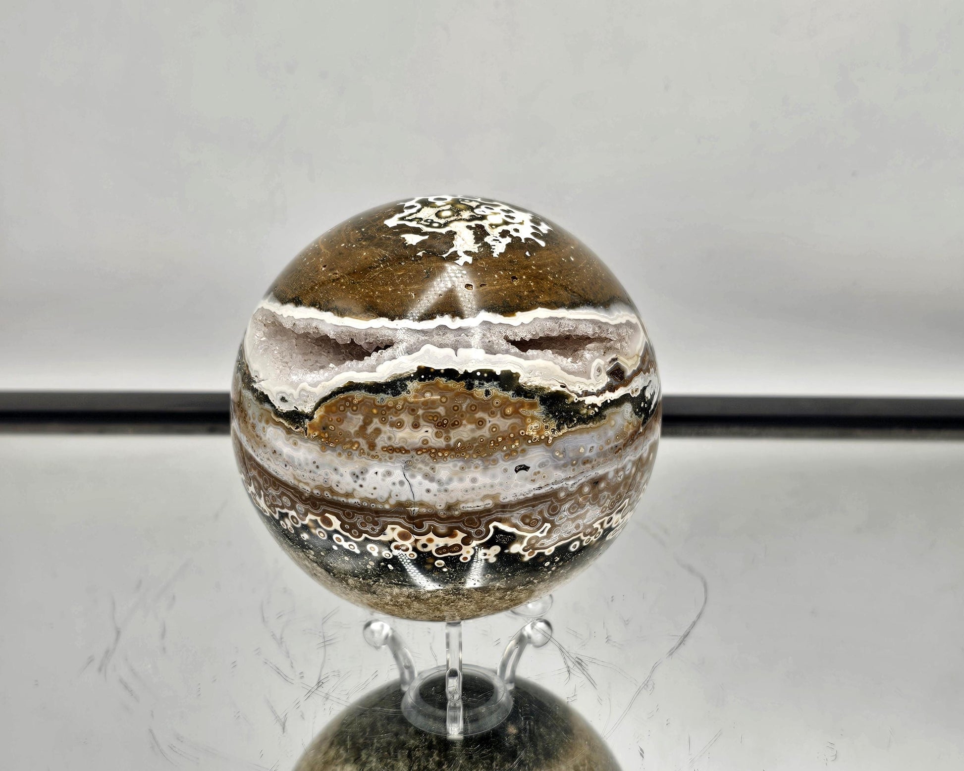 Large Orbital Ocean Jasper Sphere with natural cavities