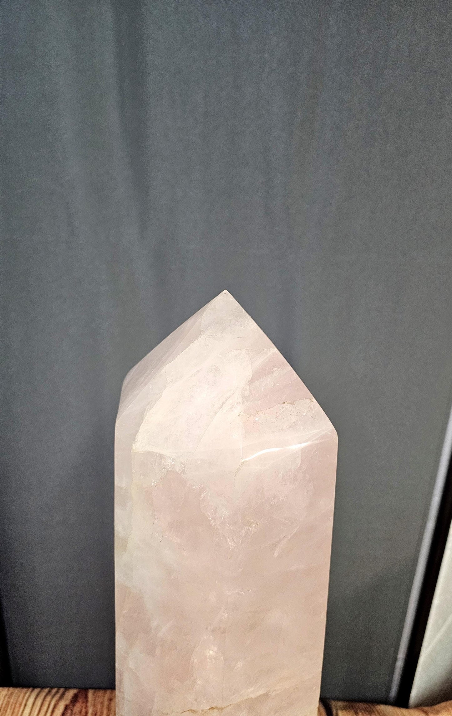 Elegant Rose Quartz Crystal Prism for serene interior design.