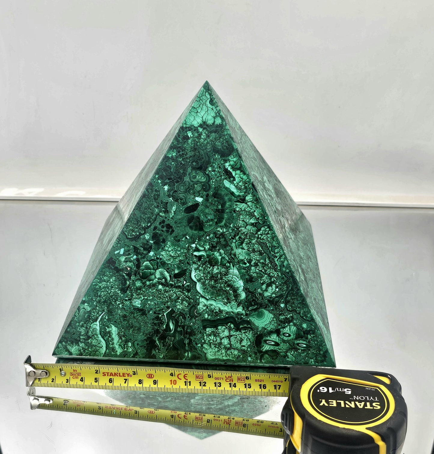 large handcrafted malachite pyramid centerpiece for high-end home décor.