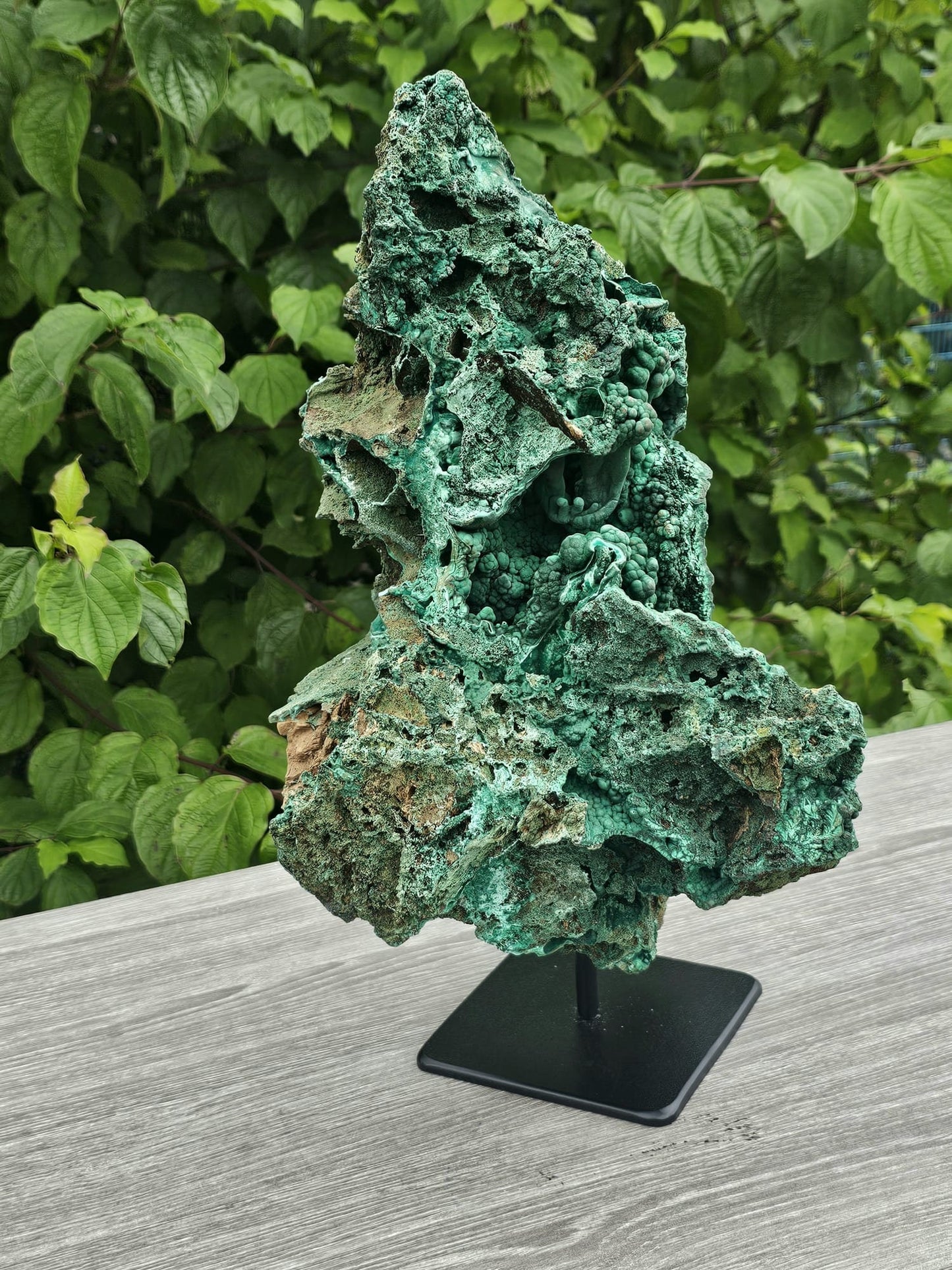 large stand mounted malachite crystal