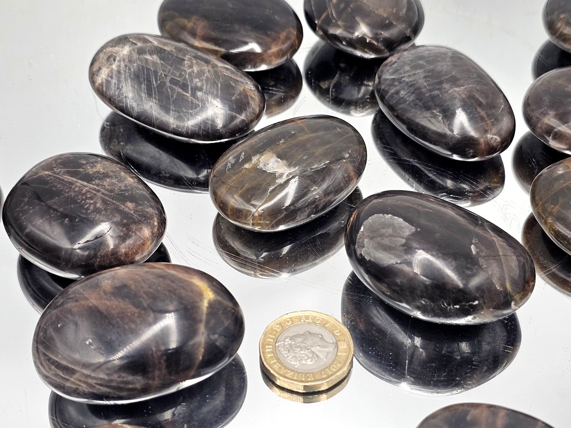 Stunning Black Moonstone Crystal Palmstones with natural patterns.