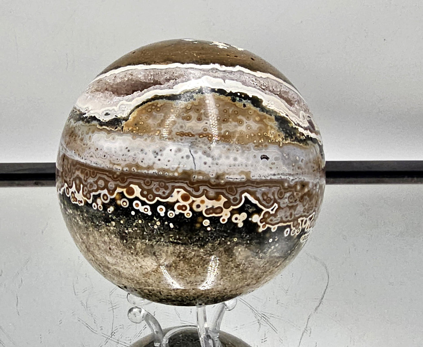 Madagascar Ocean Jasper crystal sphere, polished finish