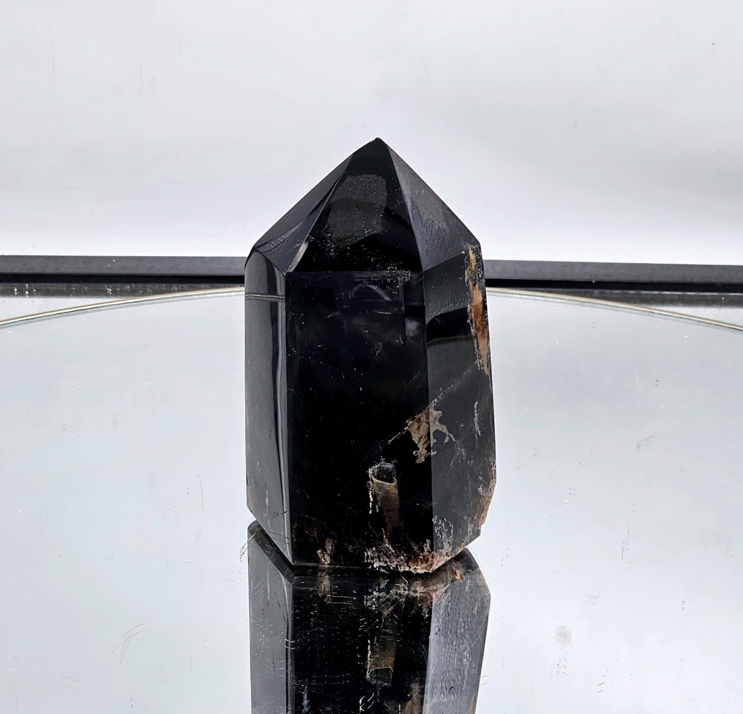 Large Morian Smoky Quartz tower with deep dark color.