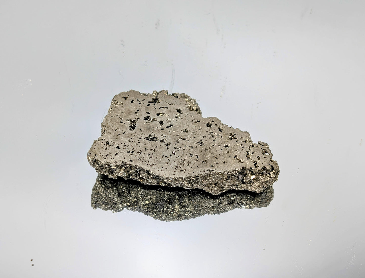  A beautifully polished Pyrite slice with a metallic sheen.