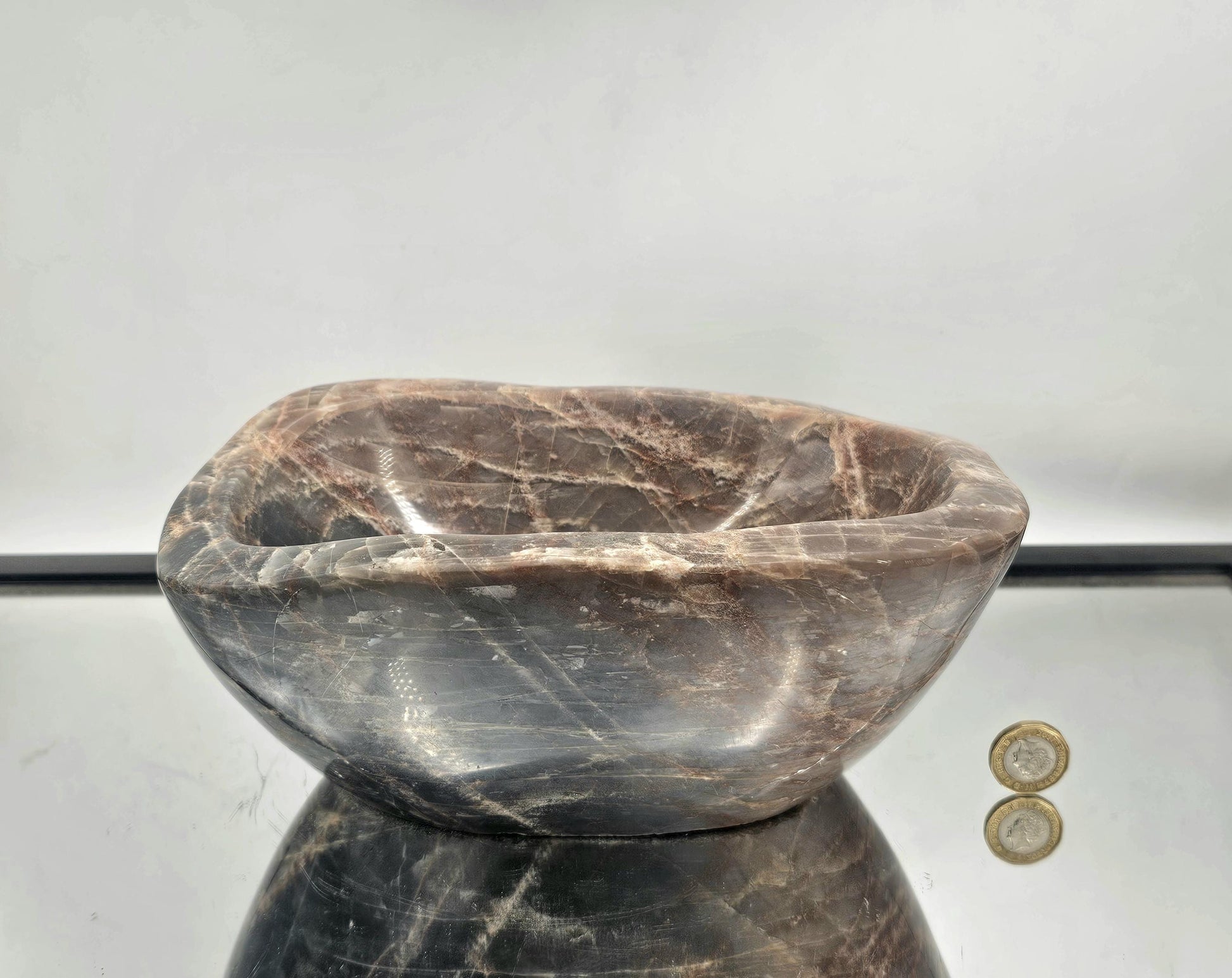 Polished Moonstone Crystal Bowl, versatile for display or holistic purposes.