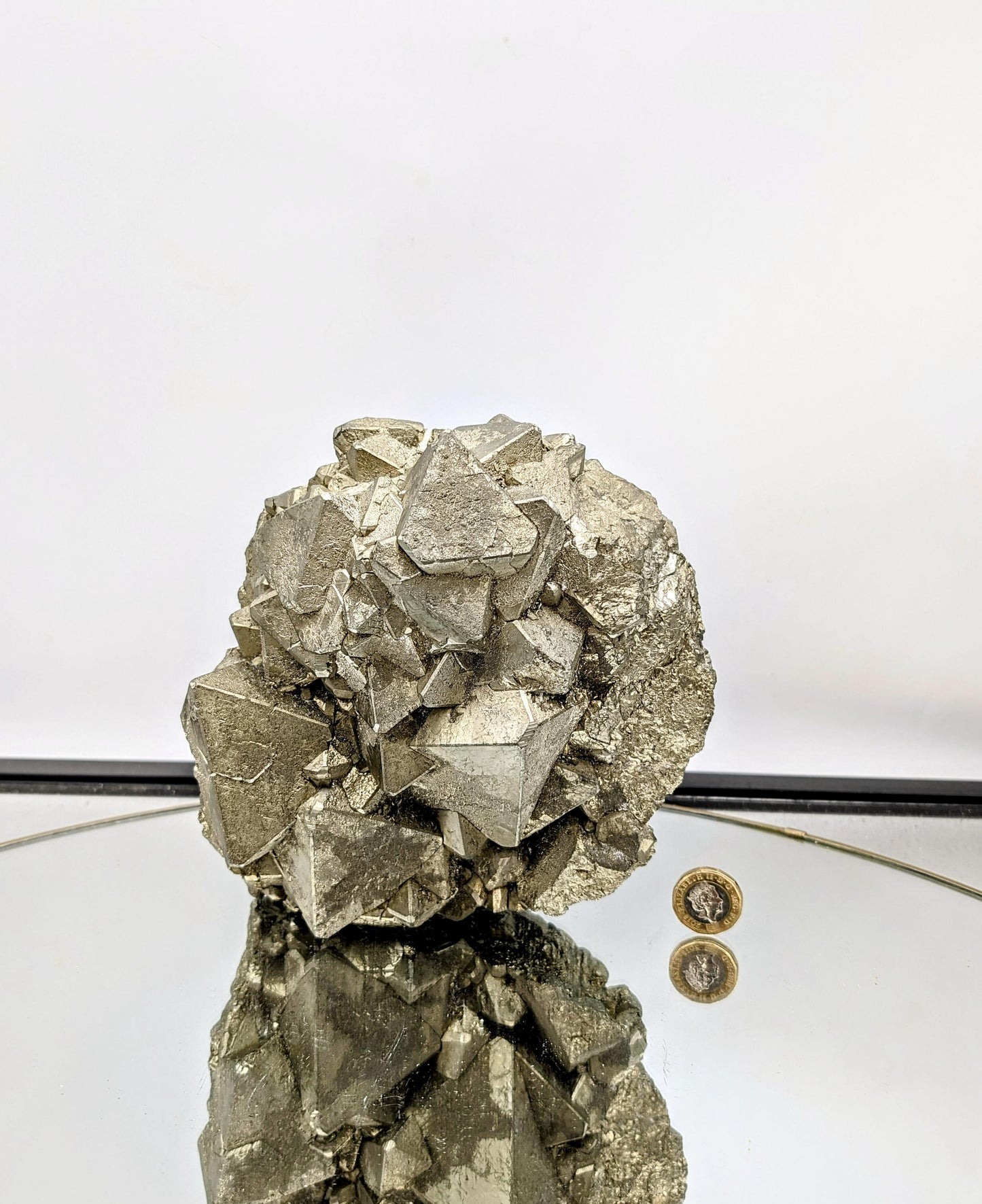 Eye-catching octahedral Pyrite crystal cluster for display.