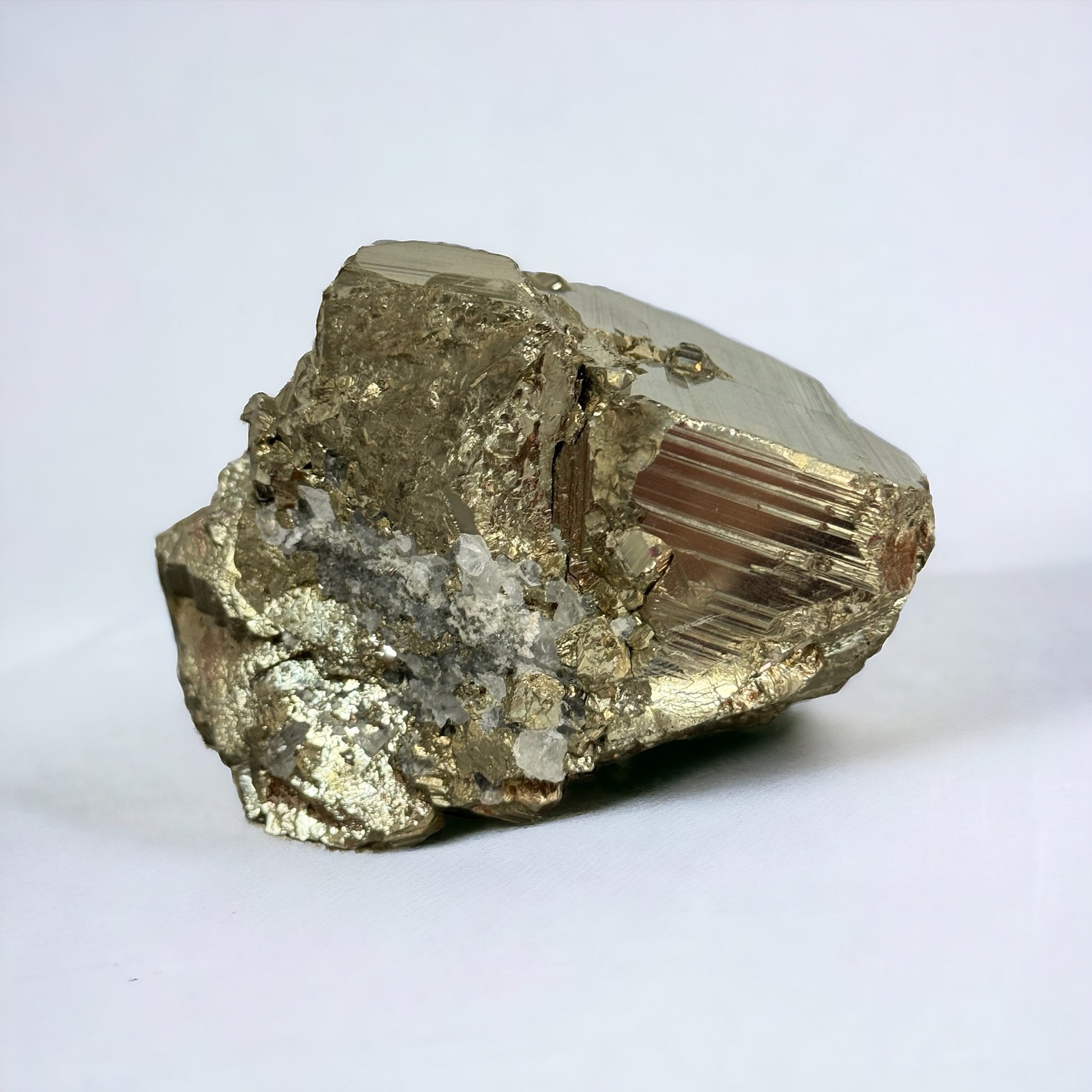 small pyrite cubes on large cube