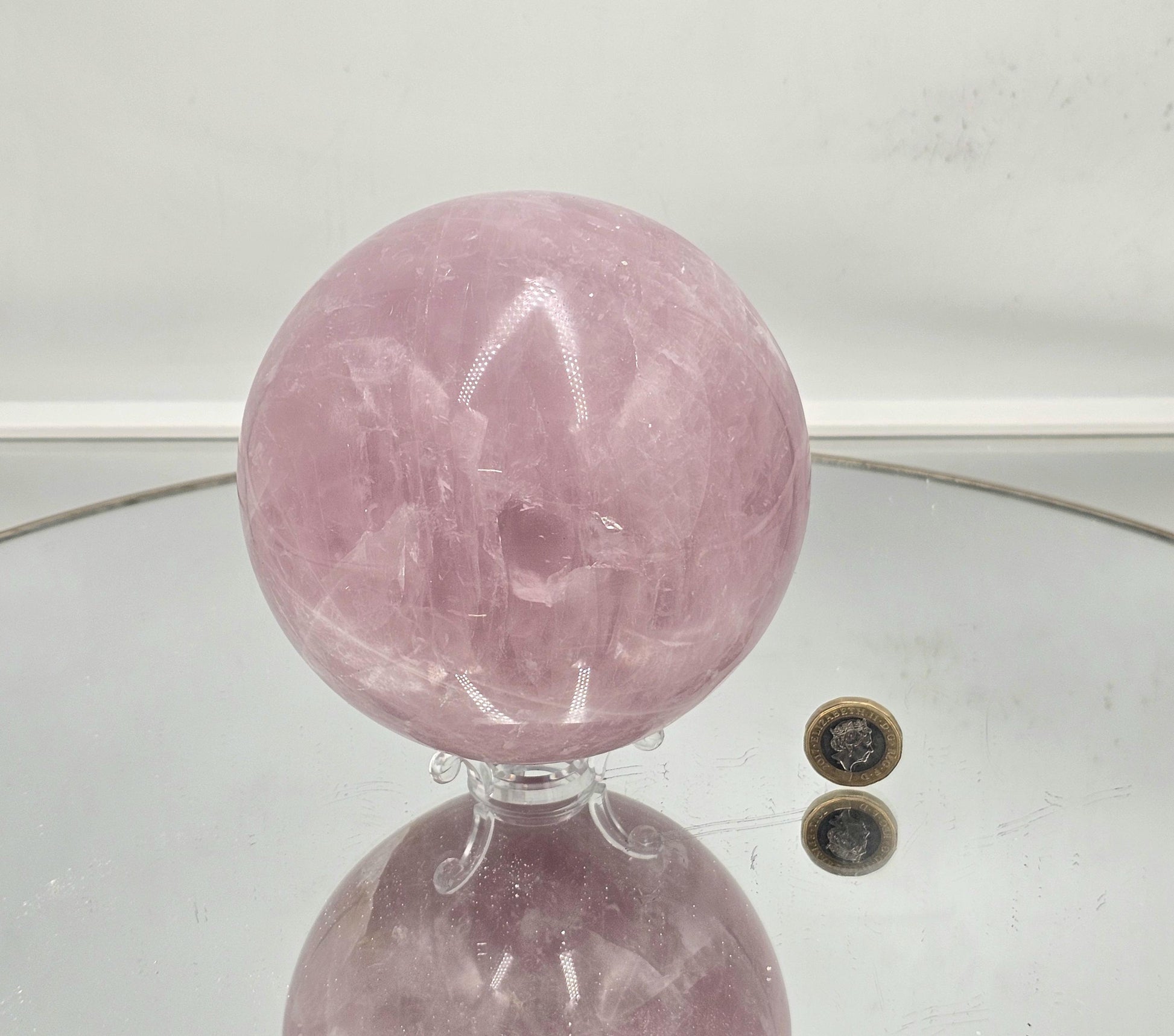 Rare star rose quartz crystal sphere for elegant display