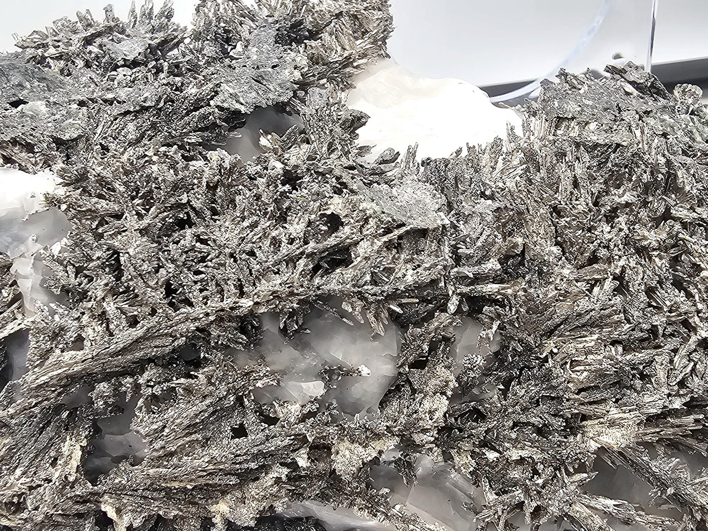 Rare native silver on calcite matrix specimen, ideal for interior design displays.