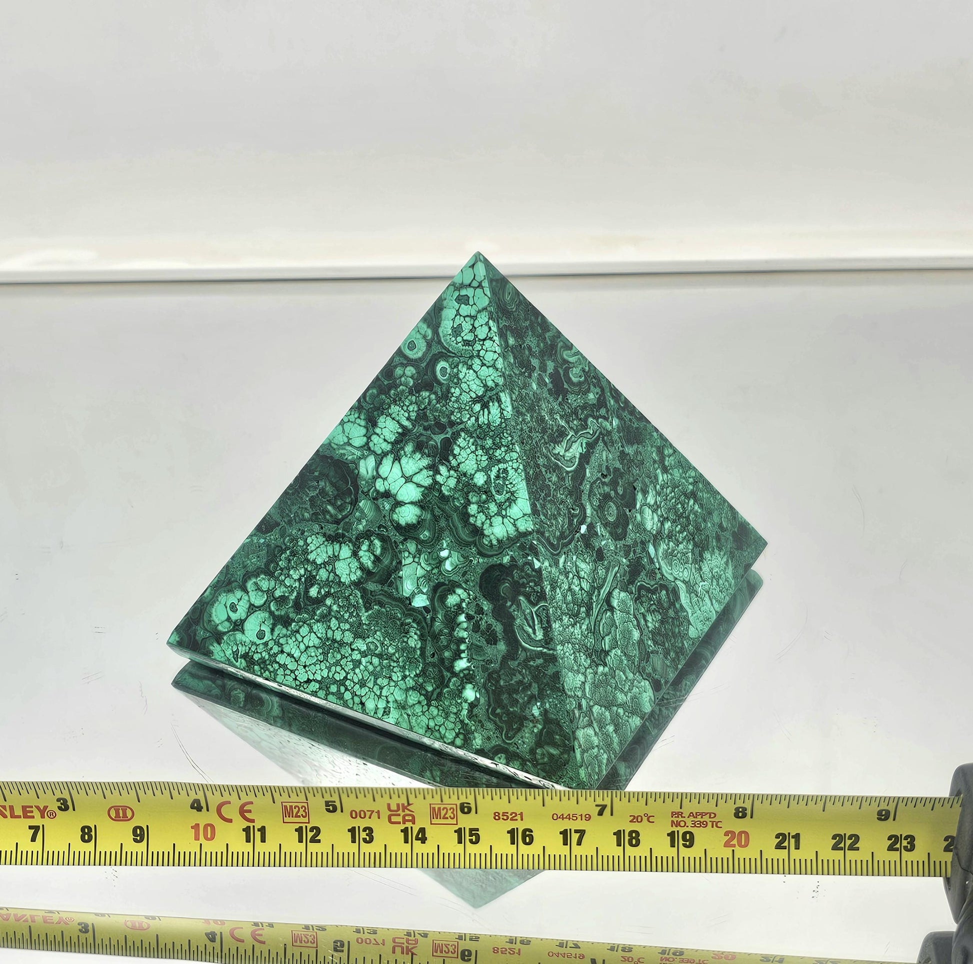 small Premium malachite pyramid designed for luxurious home décor.