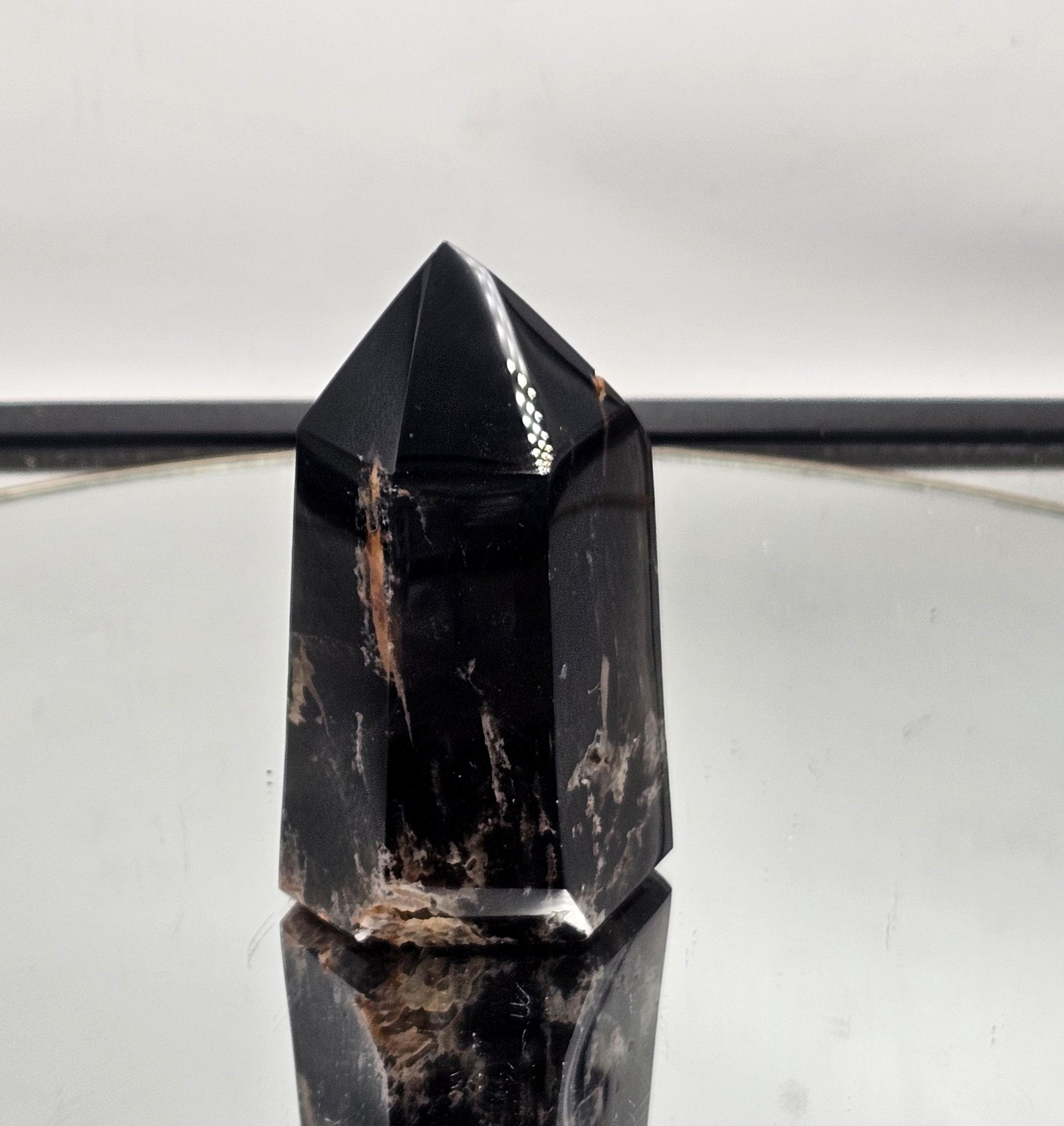 Naturally dark Morian Smoky Quartz tower from Madagascar.