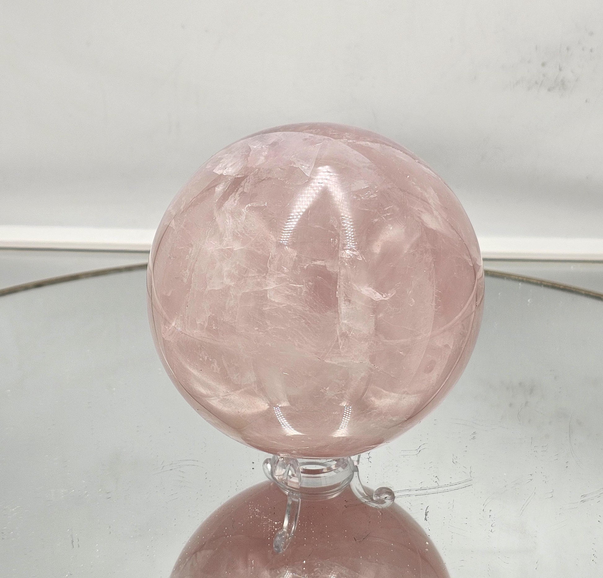 Natural pink star rose quartz sphere with rare asterism effect