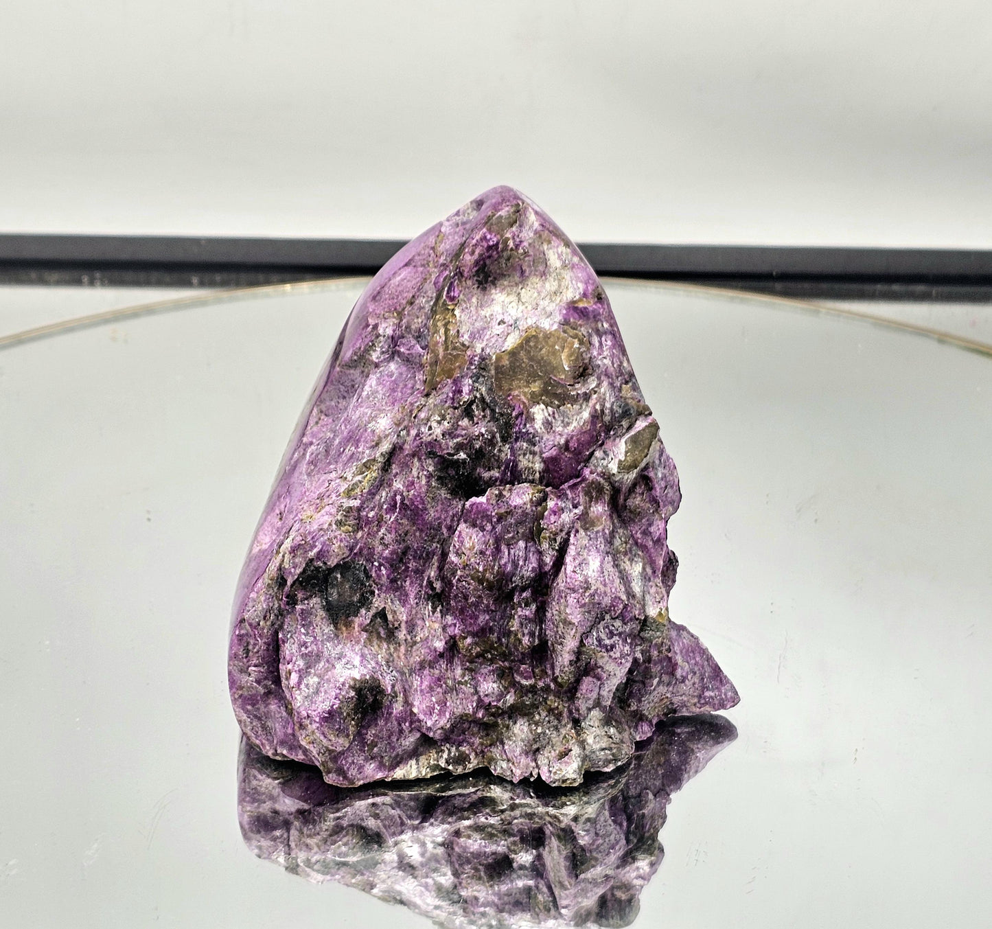 Stunning Stichtite freeform crystal for unique display.