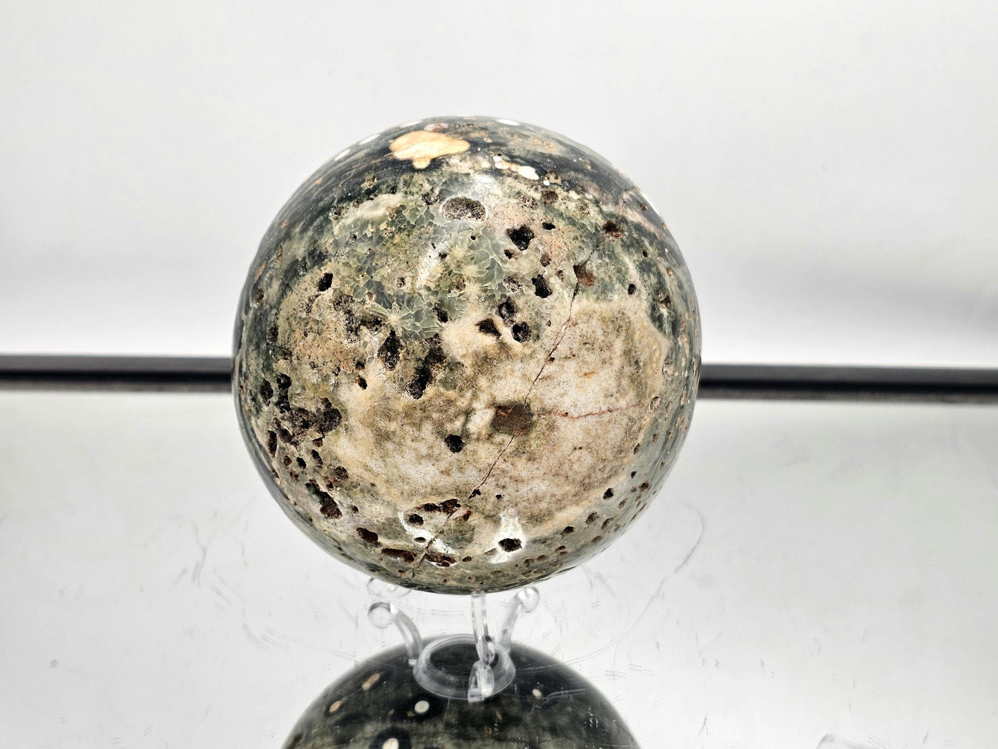 Unique Ocean Jasper sphere, perfect as a home decor centerpiece or crystal display.