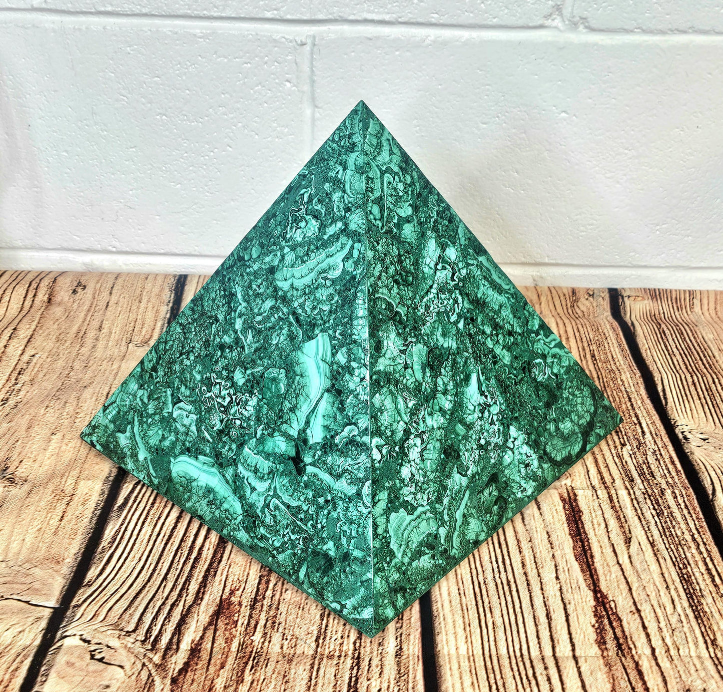 XL malachite pyramid with rich green bands, perfect for luxury interior design.