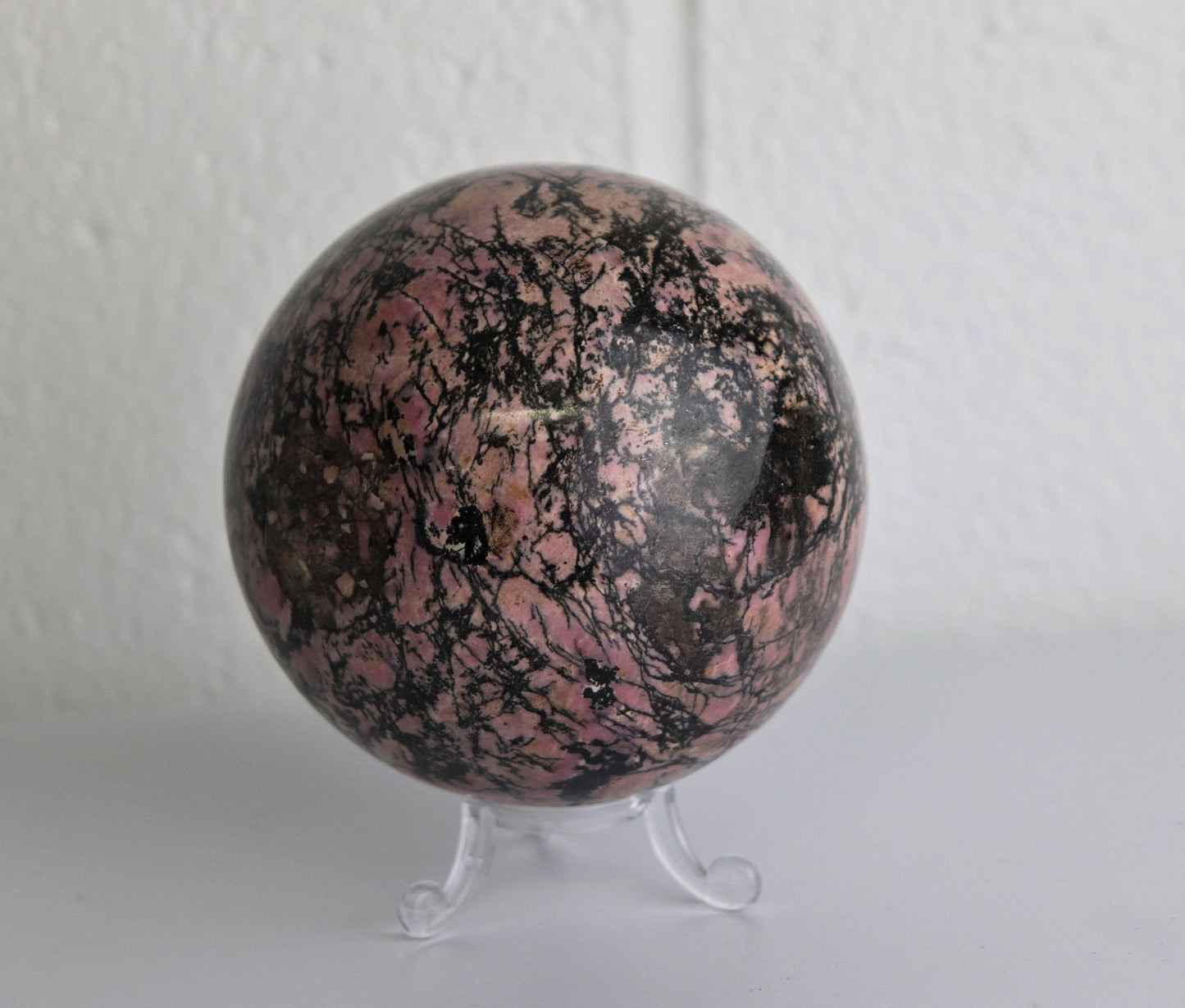 59) Large Rhodonite Crystal Sphere 4"