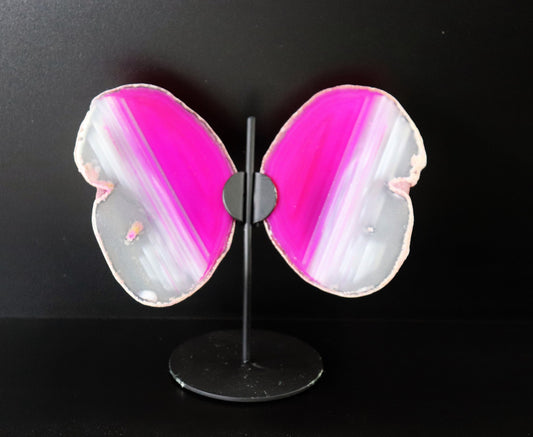 large pink agate slice crystal butterfly wings on stand