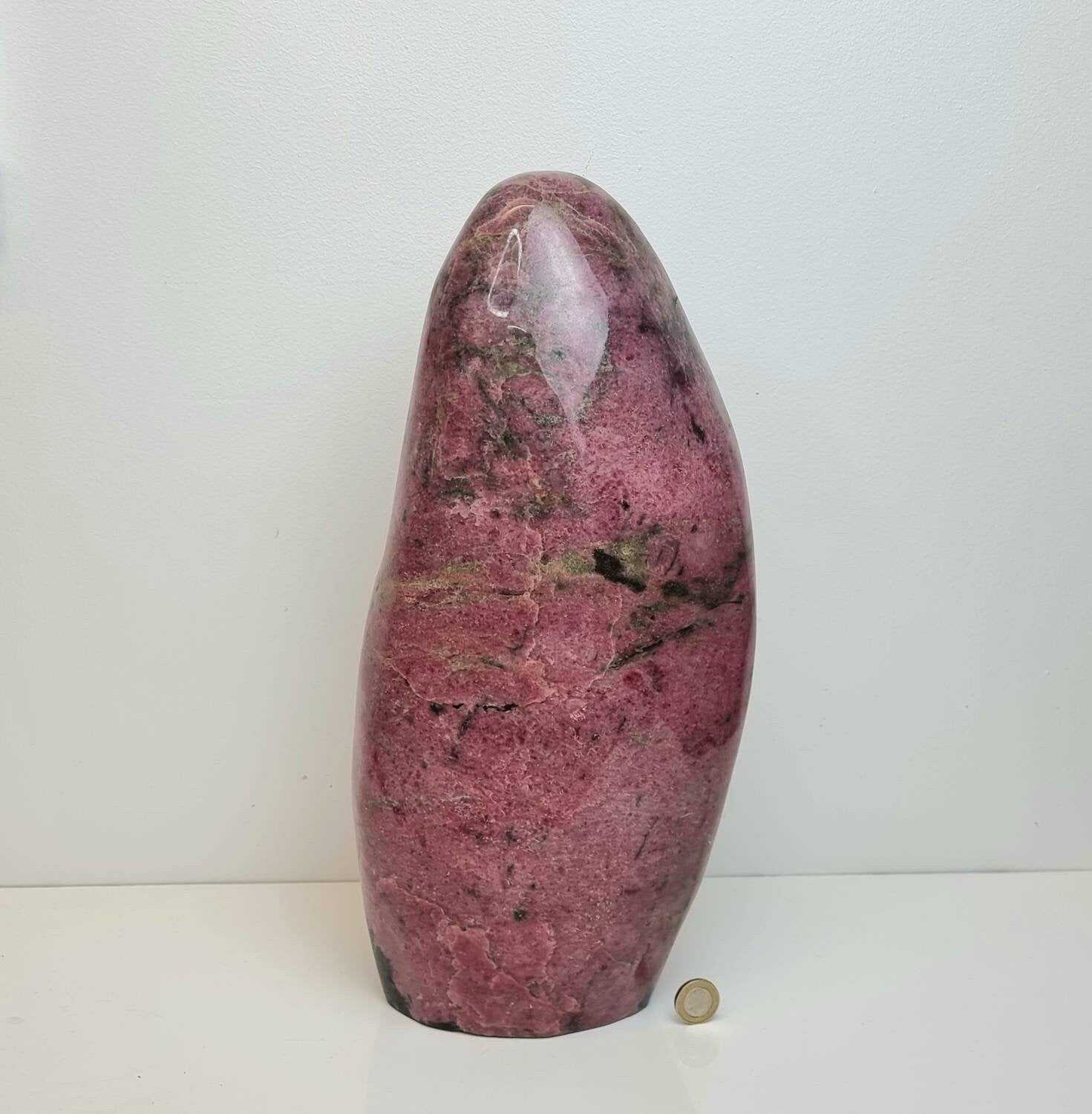 Deep pink rhodonite crystal fully polished high quality