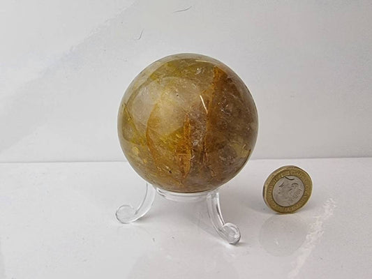 9) Golden Healer Quartz Crystal Sphere